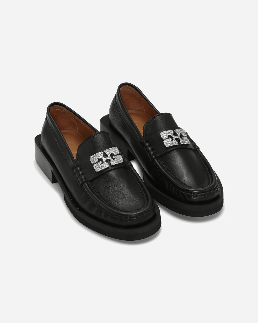 Ganni loafers in leather with metal monogram